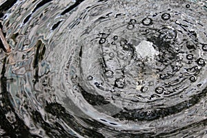 Bubbling water fountain with bubbles and ripples