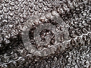 Bubbly black plastic