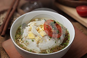 Bubur Ayam or Indonesian Chicken Porridge with Soup