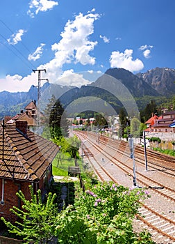 Bucegi mountain view and train station in Busteni, Romania