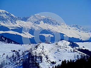 Bucegi mountains from moeciu fundata Charpatian mountains in the winter photo