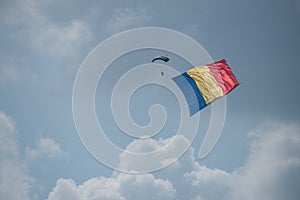 Bucharest international air show BIAS, parachute troopers with Romanian national flag