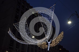 Bucharest night in December with Christmas decorations on Calea Victoriei Boulevard