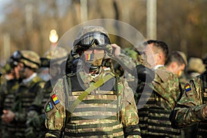 Romanian army soldiers prepare for the Romanian national day military parade