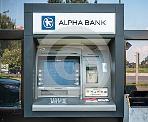 Bucharest/Romania - 06.28.2020: Detail with Alpha bank ATM or cash machine in Bucharest