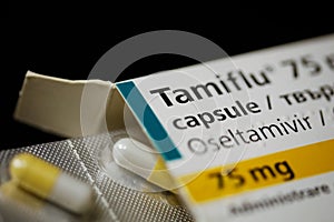 Close up image with a Tamiflu capsule oseltamivir on a blister pack, an antiviral medication that blocks the actions of