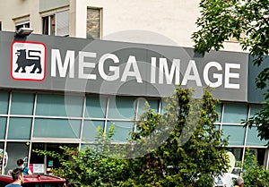 Bucharest/Romania - 06.22.2020: Logo of the Mega Image supermarket at the entrance of the store in Bucharest. Mega image is a part