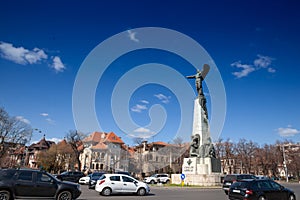 Monument to the heroes of the air (monumentul eroilo aerului) with heavy car traffic in photo