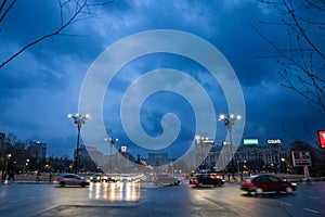 BUCHAREST, ROMANIA - MARCH 13, 2023: Selective blur on a panorama of the Bulevardul unirii, or unity boulevard at night with cars