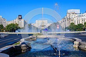 Bucharest, Romania, 4 September 2021: Decorative fountain with small water drops in Unirii Square Piata Unirii in the city