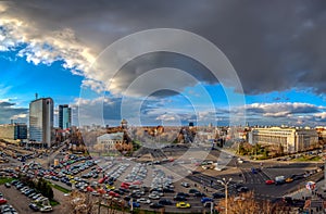 Bucharest Victoria square with government building and corporate office building