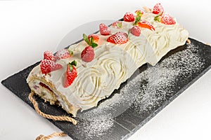 Buche de Noel. Traditional Christmas dessert, Christmas yule log cake. Copy space