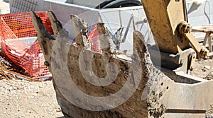 bucket of a bulldozer in a construction site