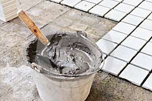 A bucket of cement in the work site