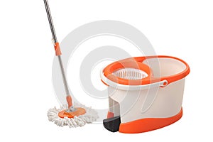 Bucket, cleaning products and mop on floor in white background