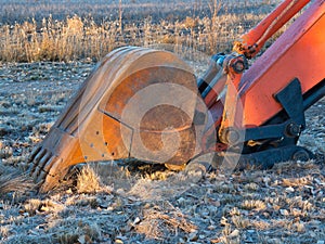 Bucket of Excavator in a Field
