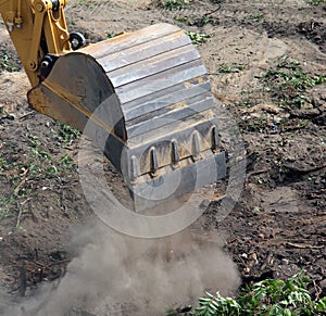 Bucket of excavator in work