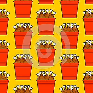 Bucket of fried chicken legs pattern seamless. vector background