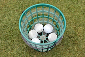 A bucket of golfballs