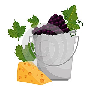 bucket with grapes cluster and cheese