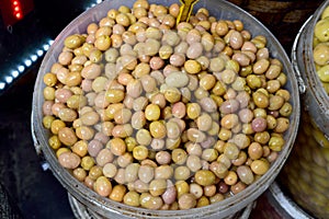 Bucket of green olives