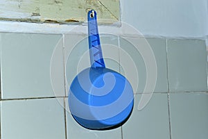 Bucket ladle for water and shower in the bathroom