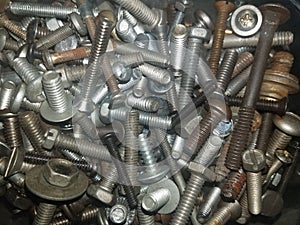 Bucket of misc nuts bolts and screws photo