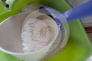 Bucket of rock salt is ready to melt your ice