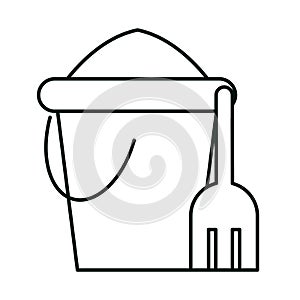 Bucket with sand and shovel toys linear icon style white background