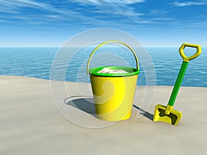 Bucket and spade on the beach