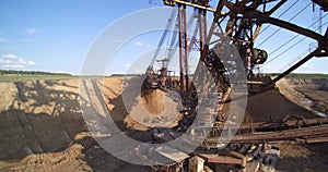 Bucket wheel excavator ladles scoop brown ground aerial