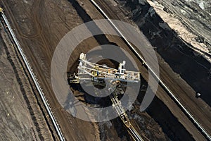 Bucket wheel excavator in a lignite quarry in process, Heavy industry.
