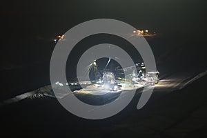 bucket-wheel excavator at night in open-cast coal mining hambach germany