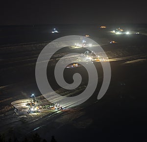 bucket-wheel excavators at night in open-cast coal mining hambach germany