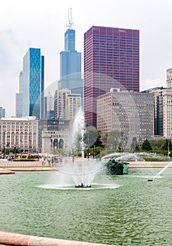 Buckingham Memorial Fountain with skyscrapers in background in Chicago Grant Park, USA
