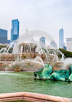 Buckingham Memorial Fountain with skyscrapers in background in Chicago Grant Park, USA