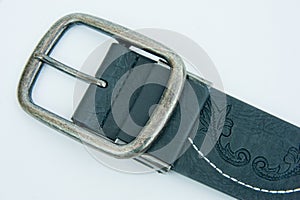 Buckle on leather belt.