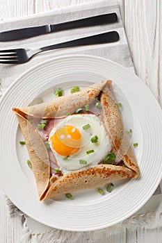 Buckwheat galettes with egg, ham, and cheese make an incredibly satisfying brunch with their savory and nutty flavor closeup on