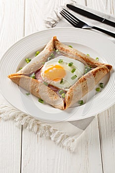 Buckwheat galettes with egg, ham, and cheese make an incredibly satisfying brunch with their savory and nutty flavor closeup on