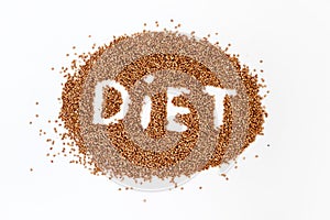 Buckwheat lettering Diet. Texture from raw buckwheat grains. Healthy food concept.