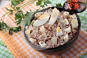 Buckwheat porridge with boiled eggs and fried onions