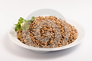 Buckwheat porridge on a white plate