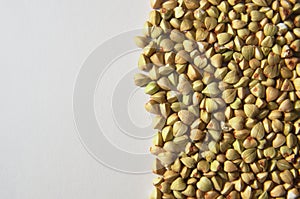 Buckwheat seeds on white background