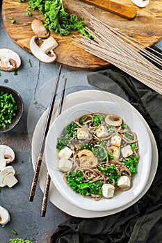 Buckwheat soba noodles tofu soup ingredients for asian chinese japanese korean vietnamese food. Top view flat lay kitchen cooking