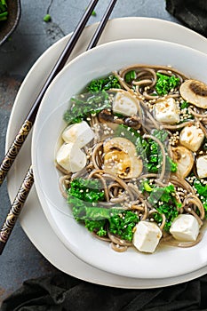 Buckwheat soba noodles tofu soup ingredients for asian chinese japanese korean vietnamese food. Top view flat lay kitchen cooking