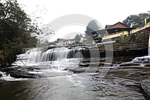 Bucolic waterfall scene in the district of Mantiqueira in the interior of the state of Minas Gerais photo