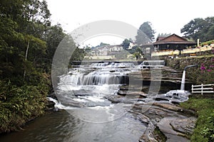 Bucolic waterfall scene in the district of Mantiqueira in the interior of the state of Minas Gerais photo