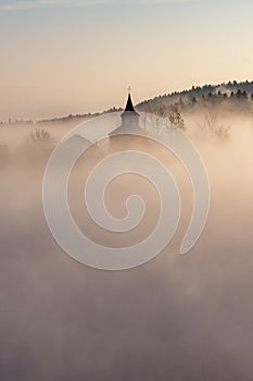 Bucovina autumn sunrise landscape in Romania with mist and mountains