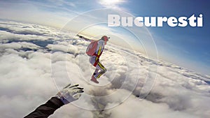 Bucuresti. Skydiver from Bucuresti performs a trick in the sky. Free fall.