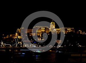 Buda Castle by the Danube river at night - Budapest, Hungary